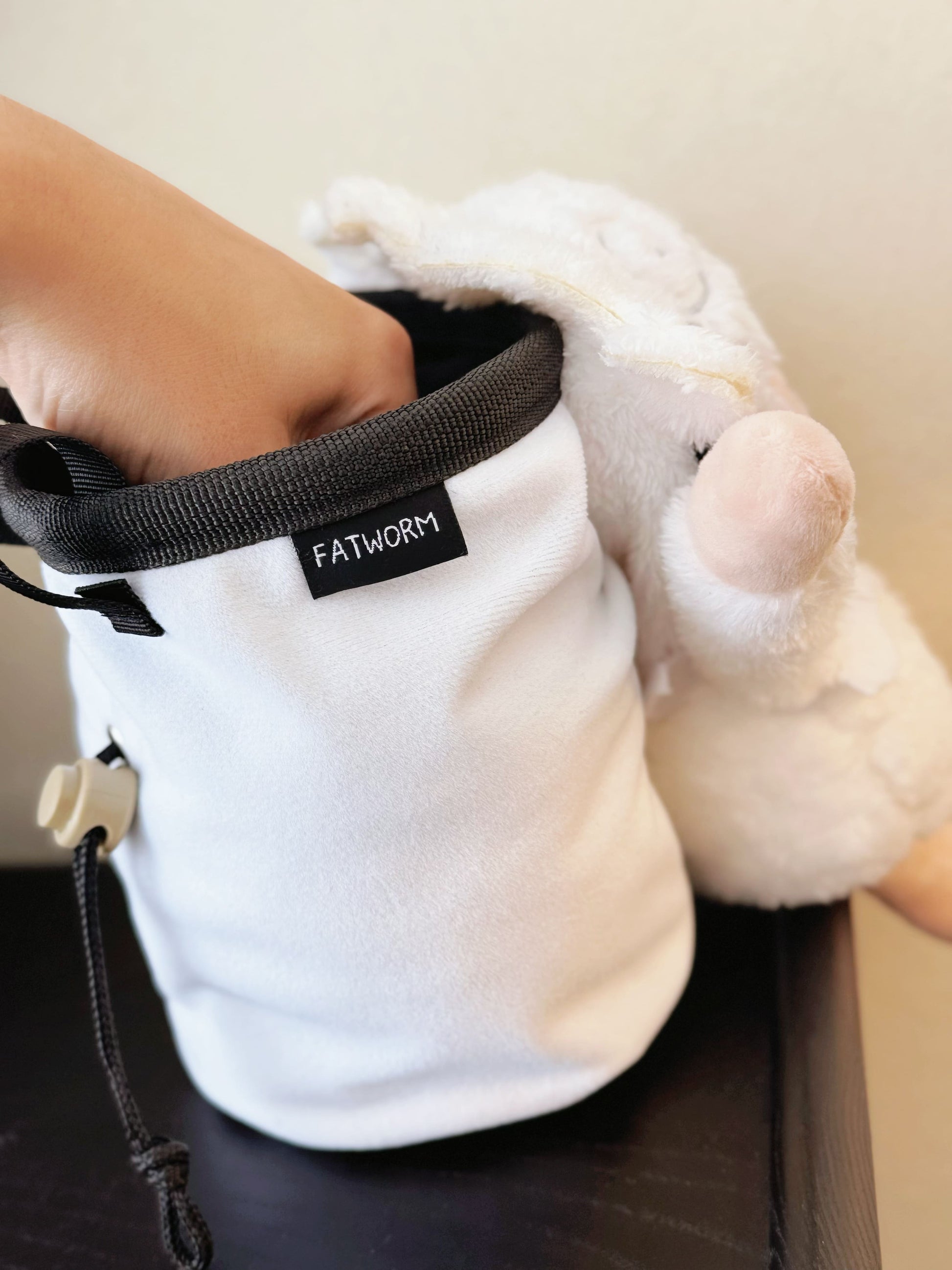 Luffy's Gear 5 transformation from One Piece Nika anime Climbing plush chalk bag, Functional climbing accessory with wide elastic opening and drawstring closure for bouldering or rock climbing.