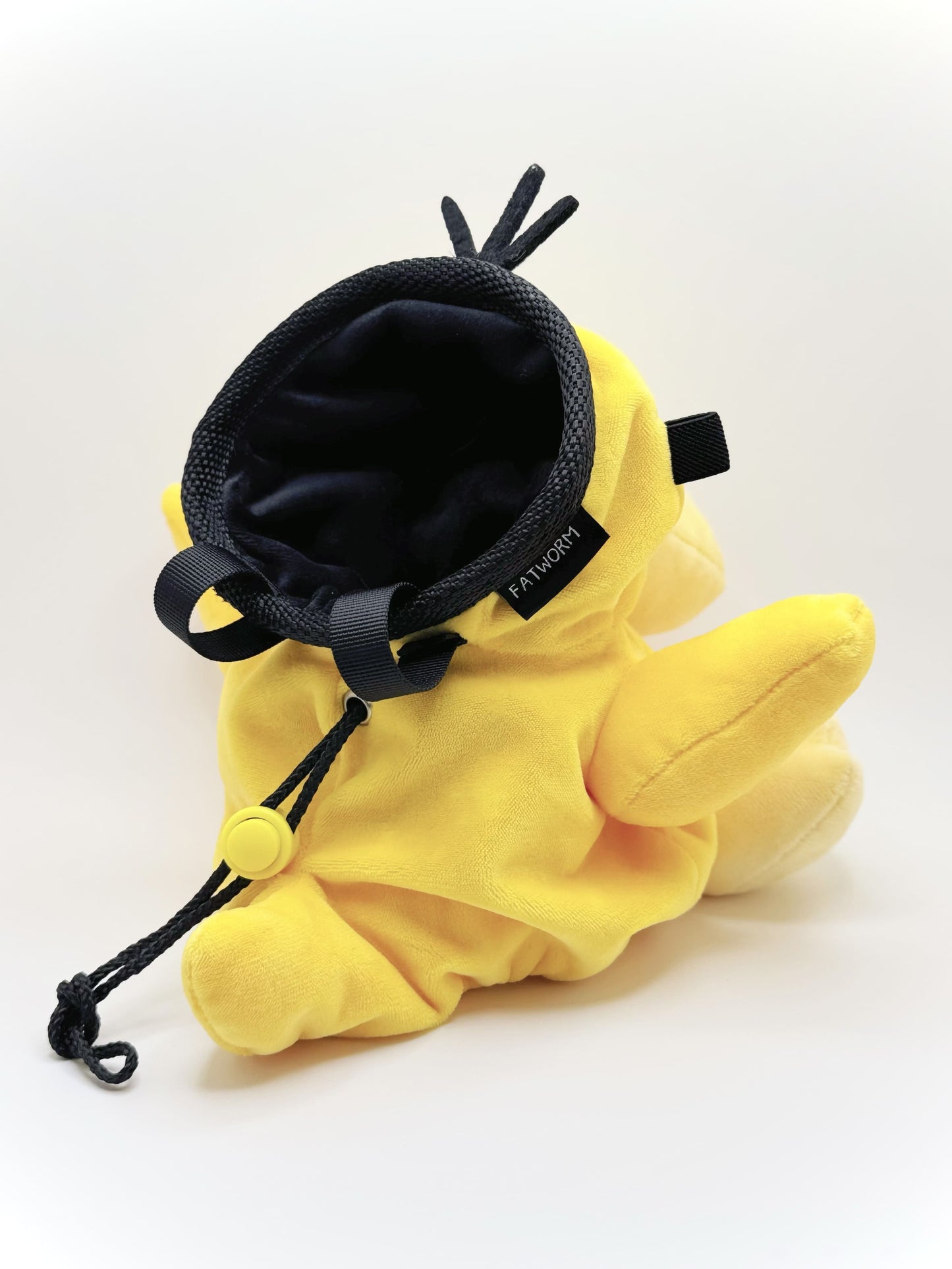 Handmade Psyduck plush anime chalk bags in two sizes – cute, functional climbing gear for bouldering enthusiasts and Pokémon fans by Fatworm Chalkbag