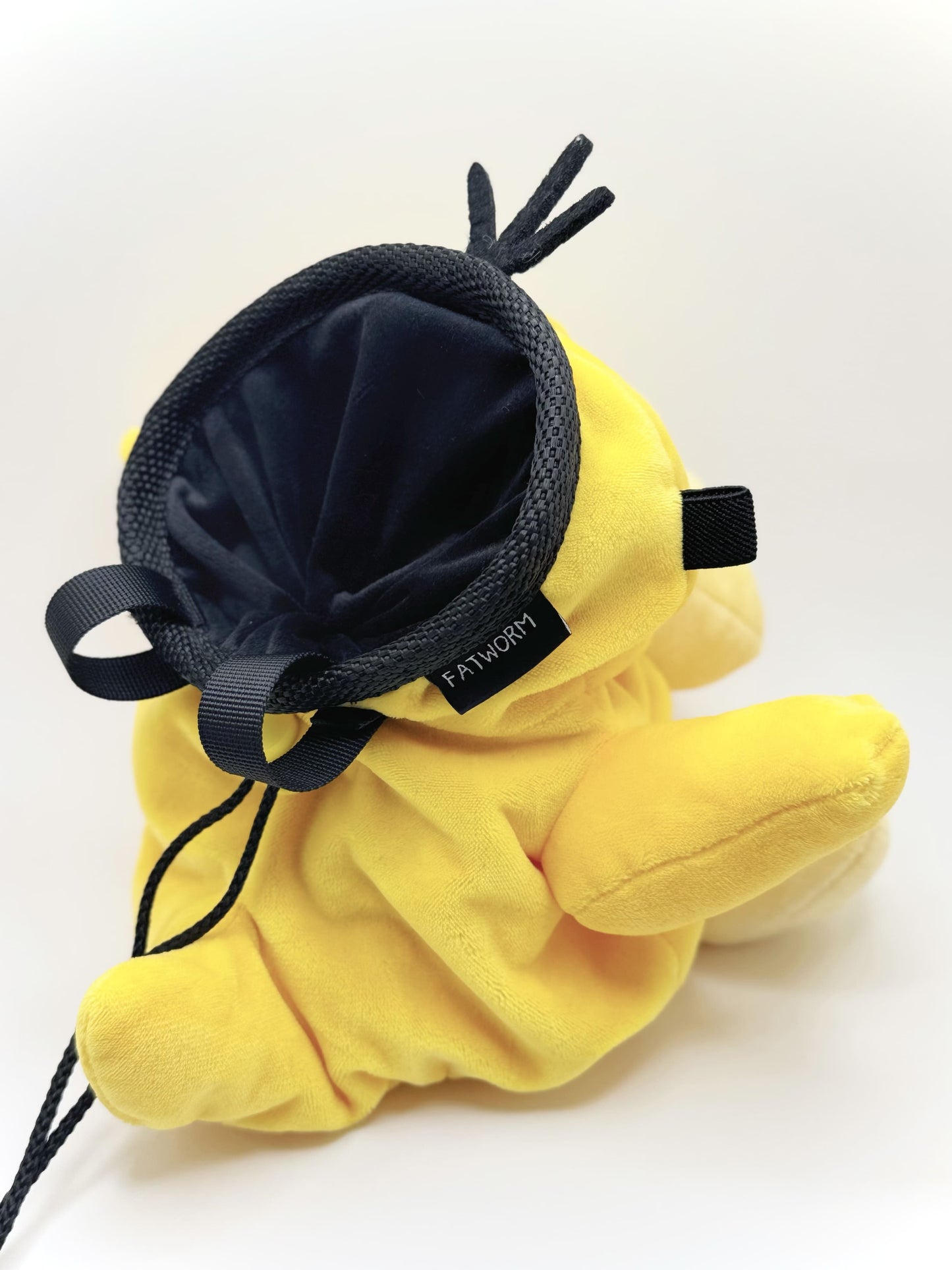 Handmade Psyduck plush anime chalk bags in two sizes – cute, functional climbing gear for bouldering enthusiasts and Pokémon fans by Fatworm Chalkbag