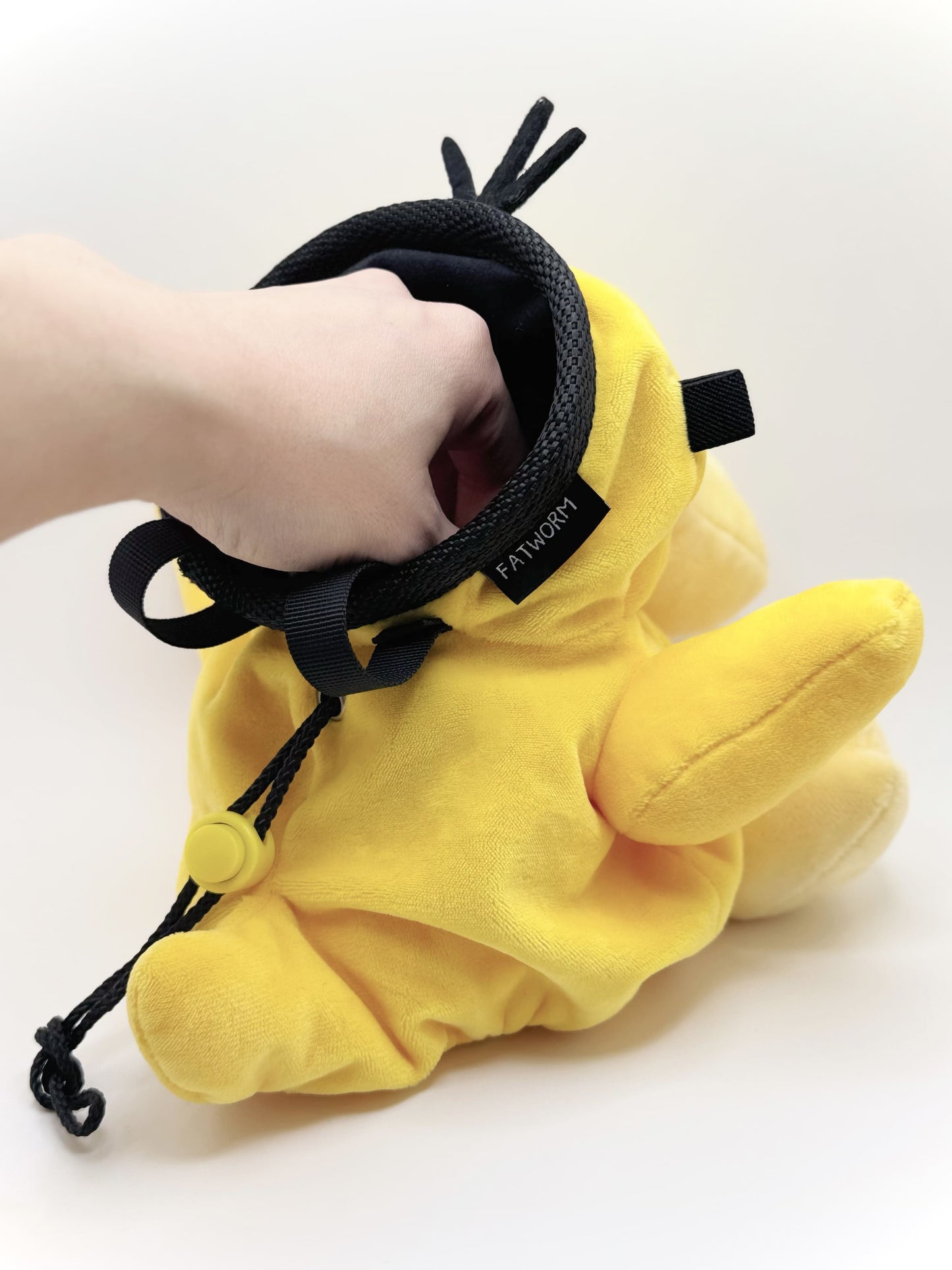 Handmade Psyduck plush anime chalk bags in two sizes – cute, functional climbing gear for bouldering enthusiasts and Pokémon fans by Fatworm Chalkbag