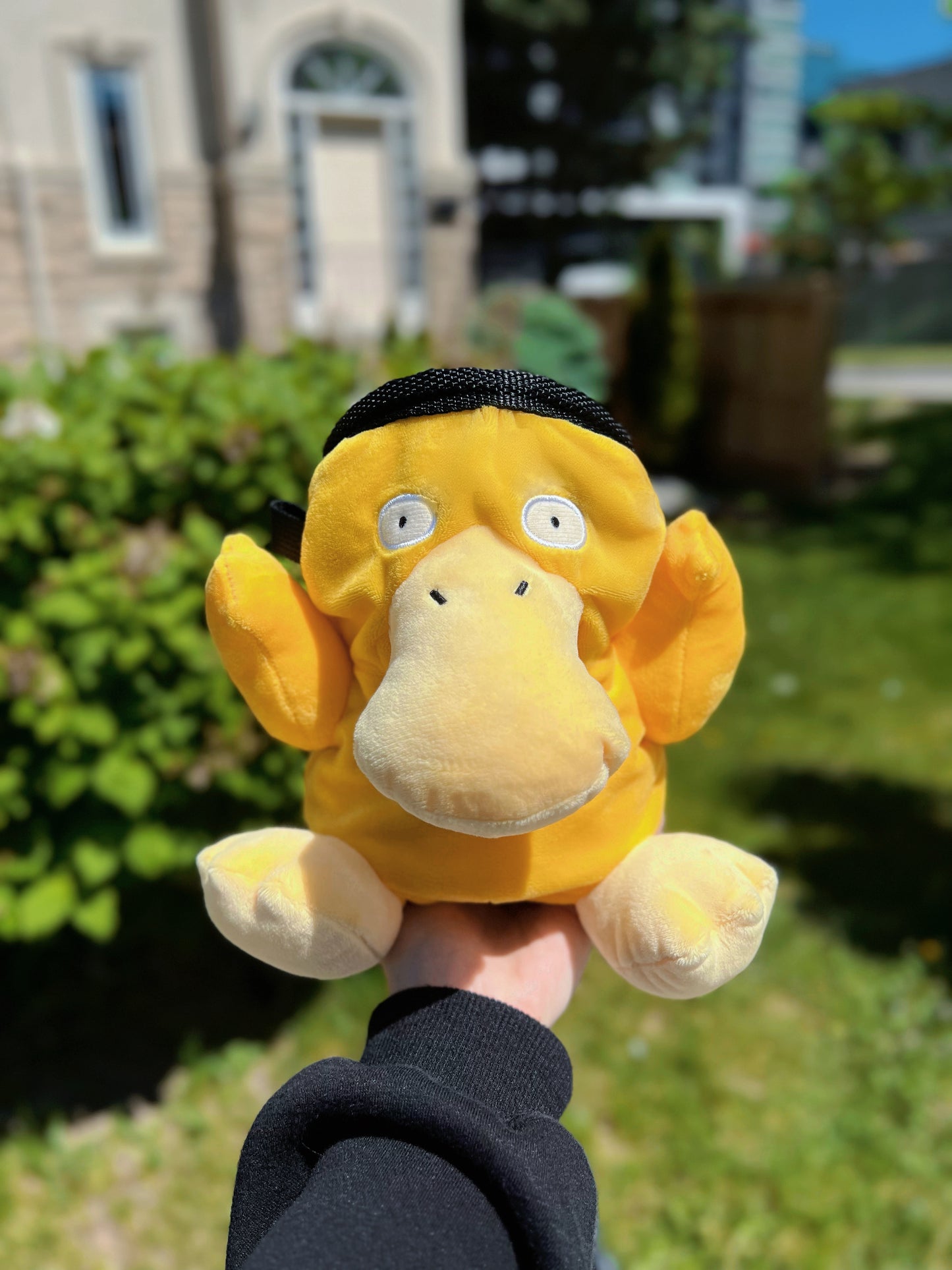 Handmade Psyduck plush anime chalk bags in two sizes – cute, functional climbing gear for bouldering enthusiasts and Pokémon fans by Fatworm Chalkbag