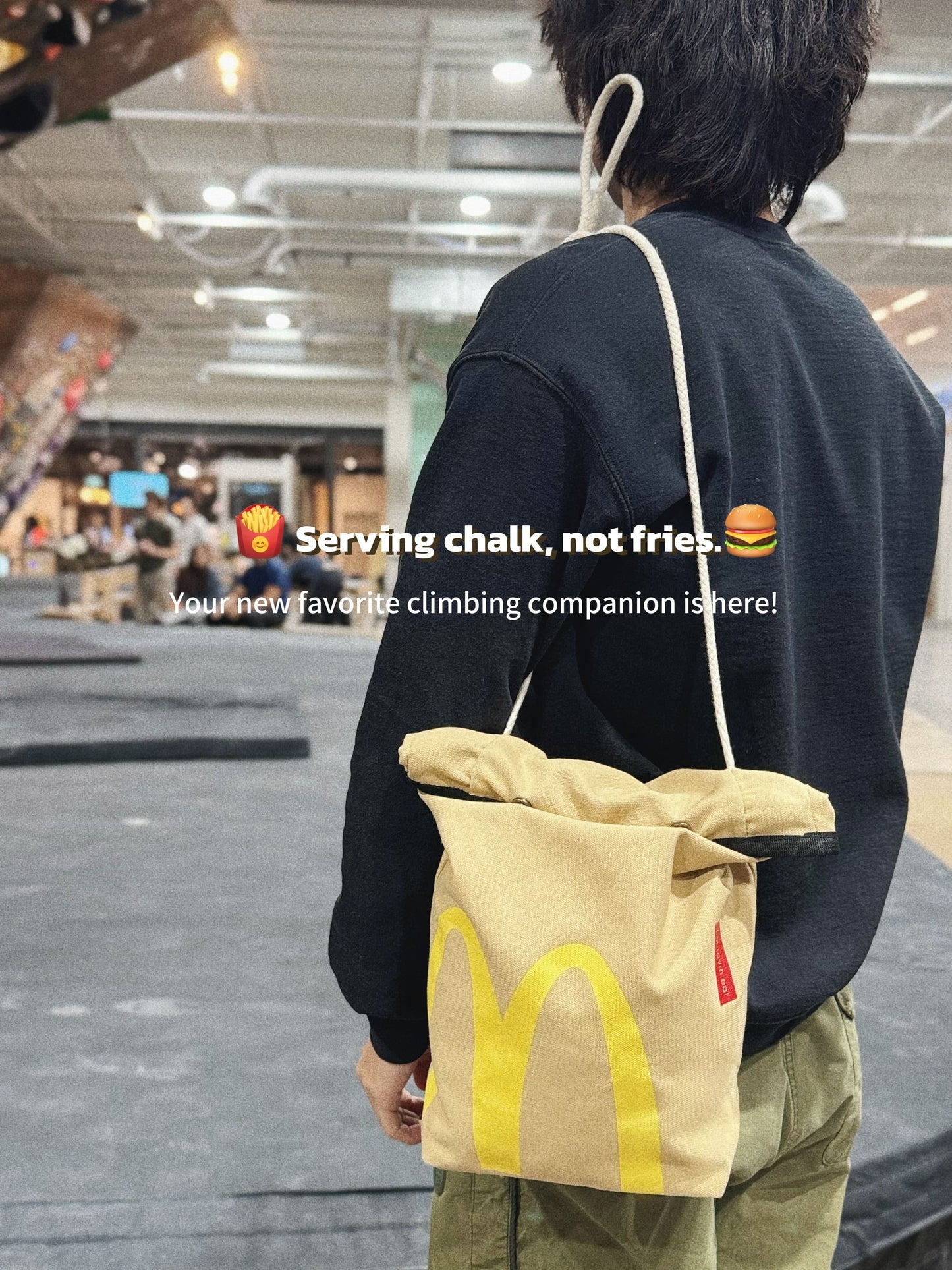 A cute plush bouldering chalk bucket by FATWORM featuring a classic red and yellow fast-food design. This functional and spacious ground-use accessory is handmade for bouldering and climbing for rock climbing, offering a long-durable design that makes the perfect climbing gift for a climber.