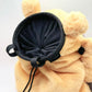 A cute, handmade plush climbing chalk bag made of extra-soft, fluffy material featuring Bidoof with chubby cheeks and iconic front teeth. Designed with high functionality by a climber, it includes a wide top rim opening, polar fleece lining, a brush loop, and a spill-proof drawstring. A great bouldering gift for rock climbers