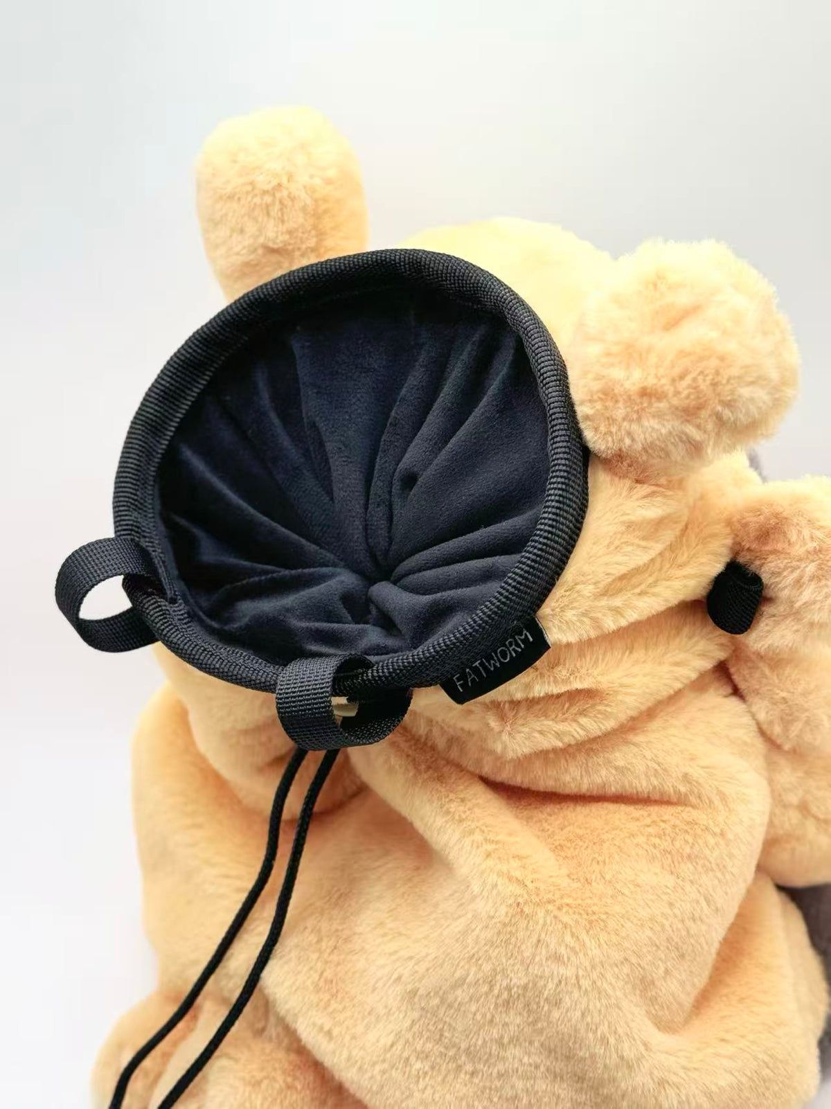 A cute, handmade plush climbing chalk bag made of extra-soft, fluffy material featuring Bidoof with chubby cheeks and iconic front teeth. Designed with high functionality by a climber, it includes a wide top rim opening, polar fleece lining, a brush loop, and a spill-proof drawstring. A great bouldering gift for rock climbers
