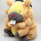 A cute, handmade plush climbing chalk bag made of extra-soft, fluffy material featuring Bidoof with chubby cheeks and iconic front teeth. Designed with high functionality by a climber, it includes a wide top rim opening, polar fleece lining, a brush loop, and a spill-proof drawstring. A great bouldering gift for rock climbers