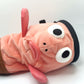 Dazed mocha brown and pink fish design on a cute plush chalk bag for rock climbing. Shows wide shocked eyes,  and a functional stiffened rim. A unique climbing gift for climbers.
