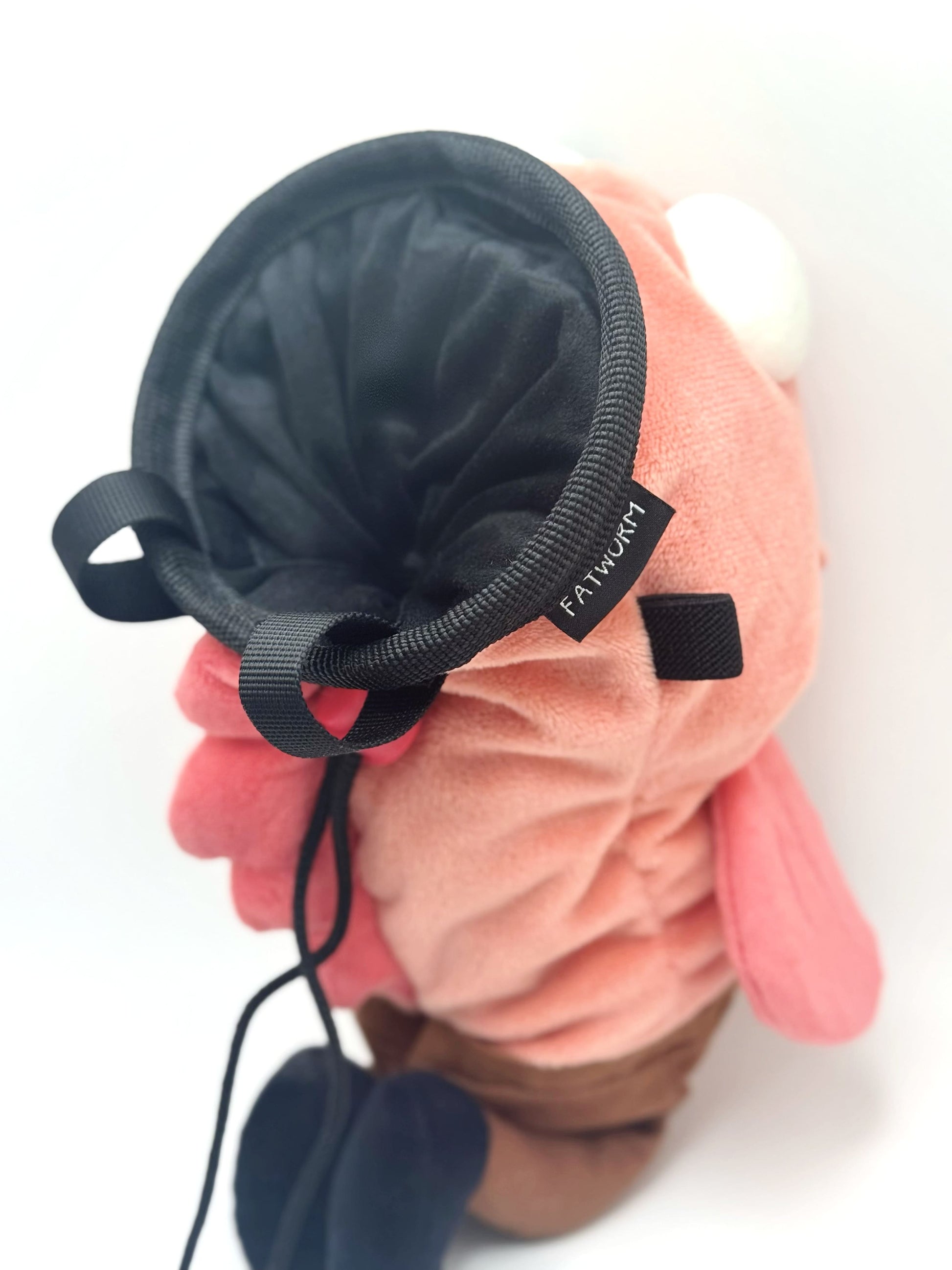 Dazed mocha brown and pink fish design on a cute plush chalk bag for rock climbing. Shows wide shocked eyes,  and a functional stiffened rim. A unique climbing gift for climbers.