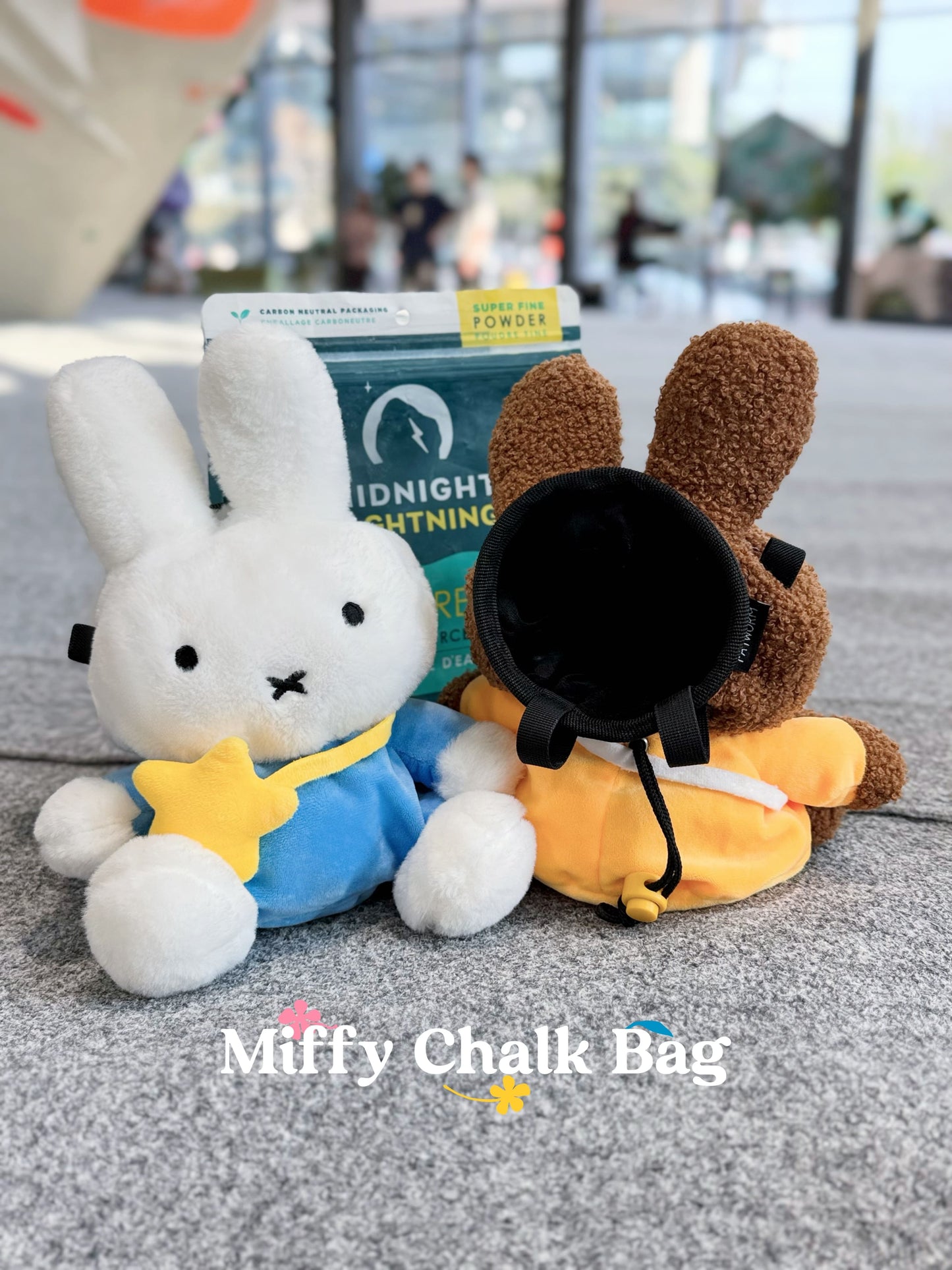 A cute anime plush miffy chalk bag by FATWORM featuring a white Vanilla Bunny wearing a blue dress and a yellow star backpack. This functional and fluffy bouldering accessory is handmade for bouldering and climbing for rock climbing, offering a long-durable design that makes the perfect climbing gift for a climber.