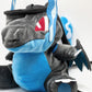Handmade matte black plush climbing chalk bag shaped like a powerful dragon with bright electric blue wings and belly. Features small blue flame-like horns and aggressive embroidered eyes. Professional bouldering gear with a reinforced black rim, secure drawstring, and deep blue fleece lining.