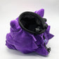 A cute anime plush chalk bag by Fatworm featuring Gengar holding a peanut. This functional and fluffy accessory is handmade for bouldering and climbing for rock climbing, offering a long-durable design that makes the perfect climbing gift for a climber.