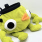 Soft plush climbing chalk bag shaped like a green game mascot with embroidered eyes. Inspired by the character Bing Bong from the co-op climbing video game PEAK. Handmade climbing chalk bag for bouldering and gym use by Fatworm