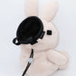 Handmade cream-colored Milk Tea Bunny plush climbing chalk bag with long floppy ears. Cute bouldering gift featuring a reinforced 12cm rim, secure drawstring, and deep black fleece lining. High-performance bouldering gear by Fatworm.