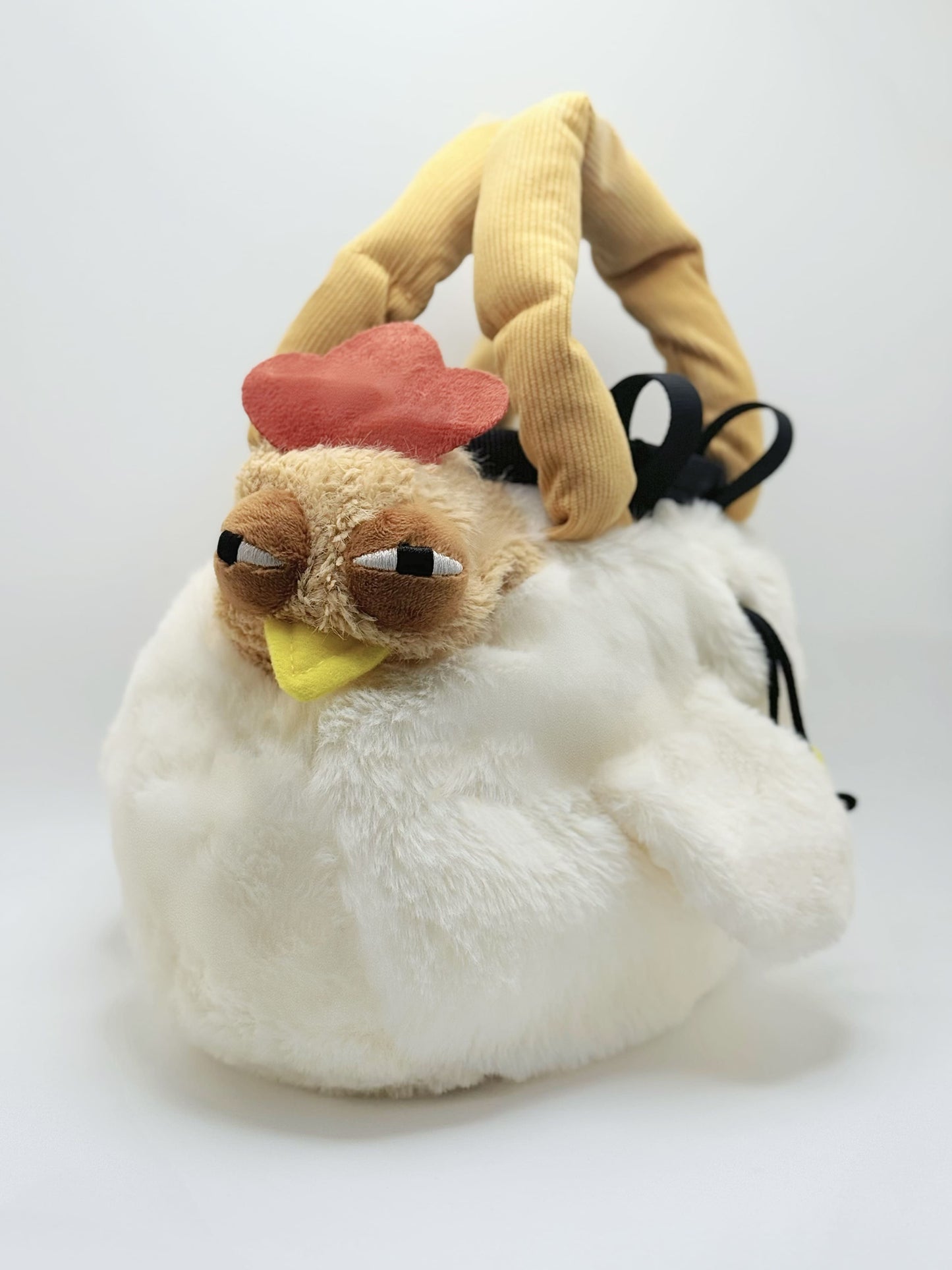 Chaotic chicken chalk bag with funny eyes, plush design, and handle – cute climbing gear for bouldering or gym use