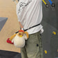 Chaotic chicken chalk bag with funny eyes, plush design, and handle – cute climbing gear for bouldering or gym use