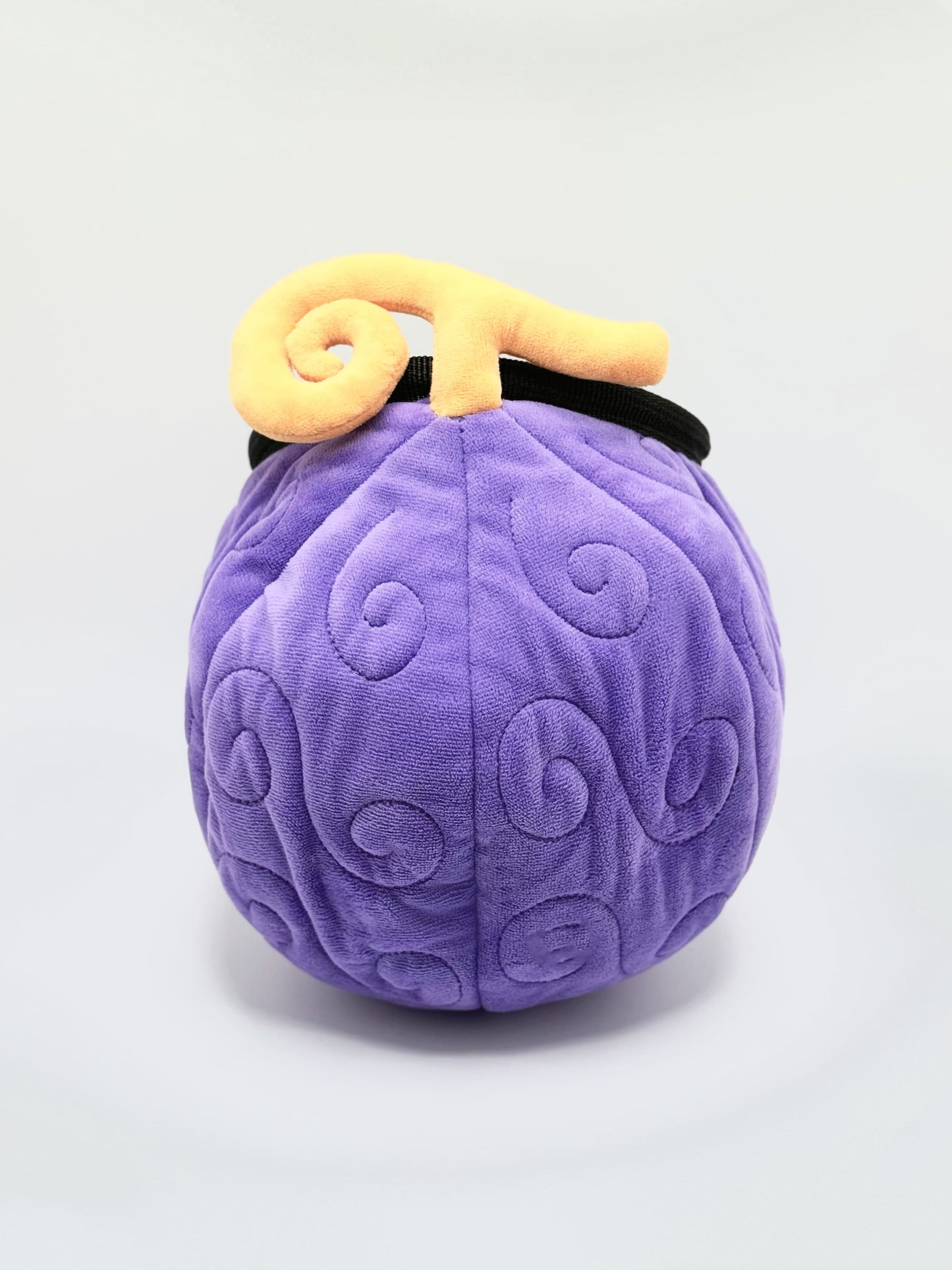 A soft and fluffy Gomu Gomu no Mi (Gum-Gum Fruit) plush chalk bag by Fatworm. This cute yet functional climbing gear features the iconic purple swirl pattern and a long-durable design. The perfect climbing gift for climbers who love unique, handmade gear.