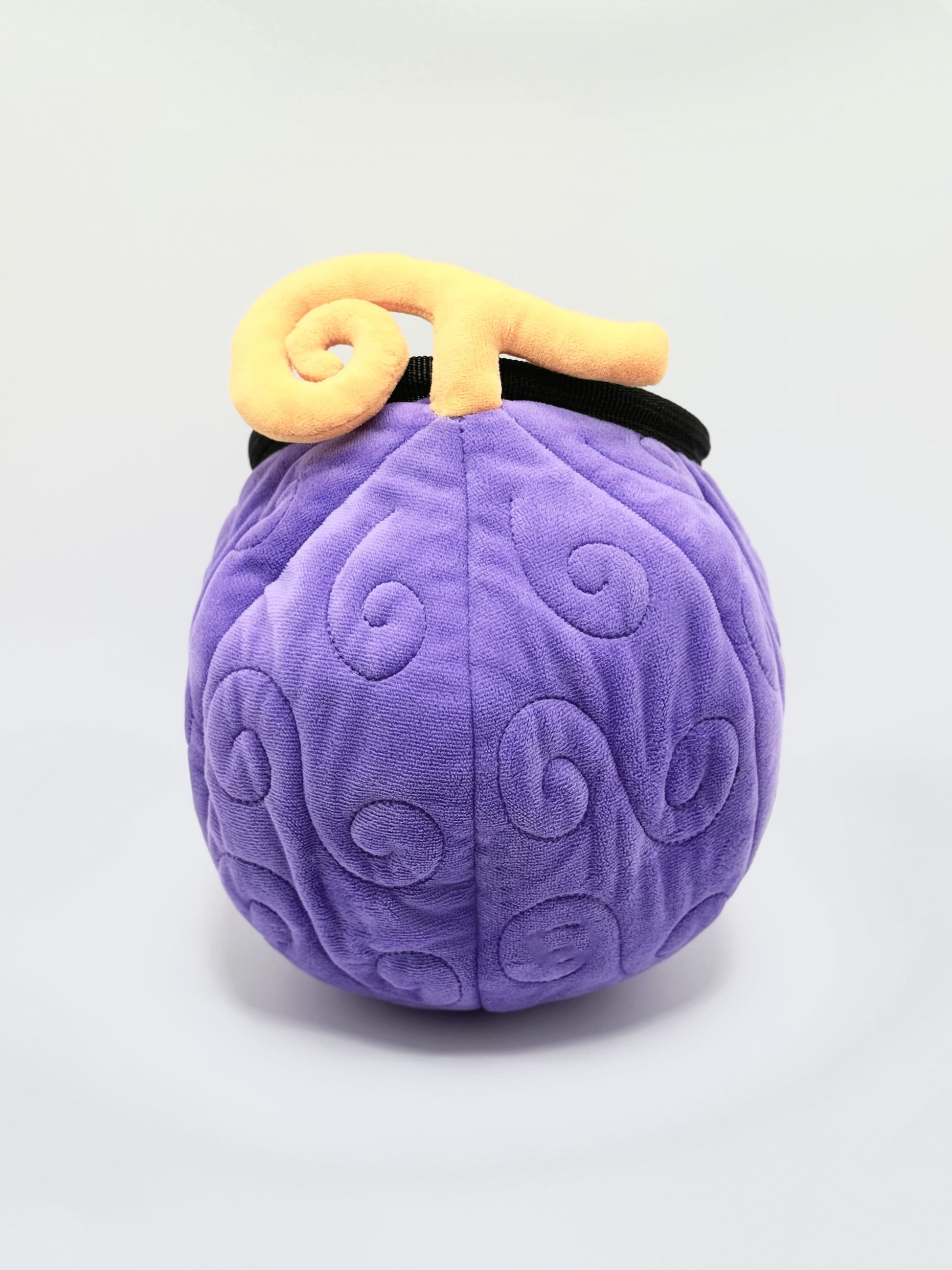 A soft and fluffy Gomu Gomu no Mi (Gum-Gum Fruit) plush chalk bag by Fatworm. This cute yet functional climbing gear features the iconic purple swirl pattern and a long-durable design. The perfect climbing gift for climbers who love unique, handmade gear.