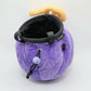 A soft and fluffy Gomu Gomu no Mi (Gum-Gum Fruit) plush chalk bag by Fatworm. This cute yet functional climbing gear features the iconic purple swirl pattern and a long-durable design. The perfect climbing gift for climbers who love unique, handmade gear.