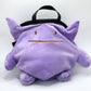 A cute, handmade plush climbing chalk bag featuring Ditto transformed into Gengar, with a purple ghost shape and Ditto’s iconic simple face. Designed with high functionality by a climber, it includes a wide top rim opening, polar fleece lining, a brush loop, and a spill-proof drawstring. A great bouldering gift for rock climbers.