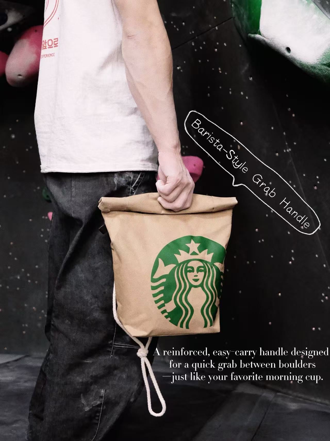 Functional and cute starbucks coffee-themed bouldering chalk bucket with a forest green exterior and black soft fleece lining, shown sitting upright on a climbing gym mat for scale.