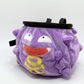 A cute anime plush chalk bag designed like Koffing by Fatworm. This functional purple bouldering and climbing accessory is handmade with a soft exterior, secure drawstring, and brush loop, making it perfect for rock climbing and a great gear addition for any climber.