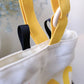 A cute anime plush chalk bag by Fatworm inspired by a famous fast food brand. This red functional bag features a vibrant yellow handle, a secure closure to prevent chalk spills, and a long-durable design, making it the perfect climbing gift for a climber into bouldering and climbing for rock climbing.