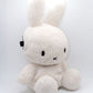 Cream beige plush Miffy climbing chalk bag featuring a cute bunny face; functional Fatworm Chalkbag gear.