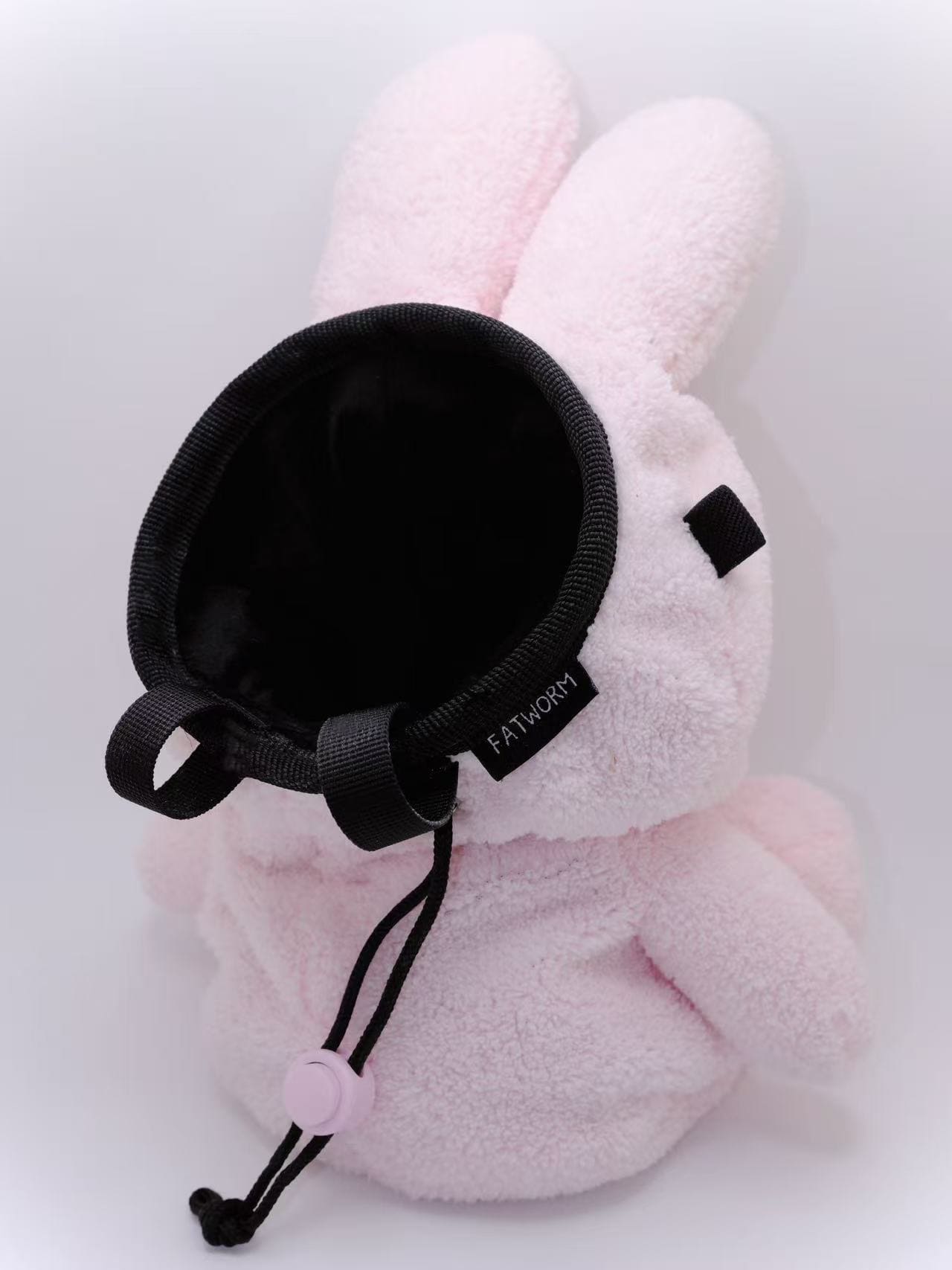 Cute climbing chalk bag in baby pink with Miffy bunny design; plush, functional Fatworm Chalkbag accessory