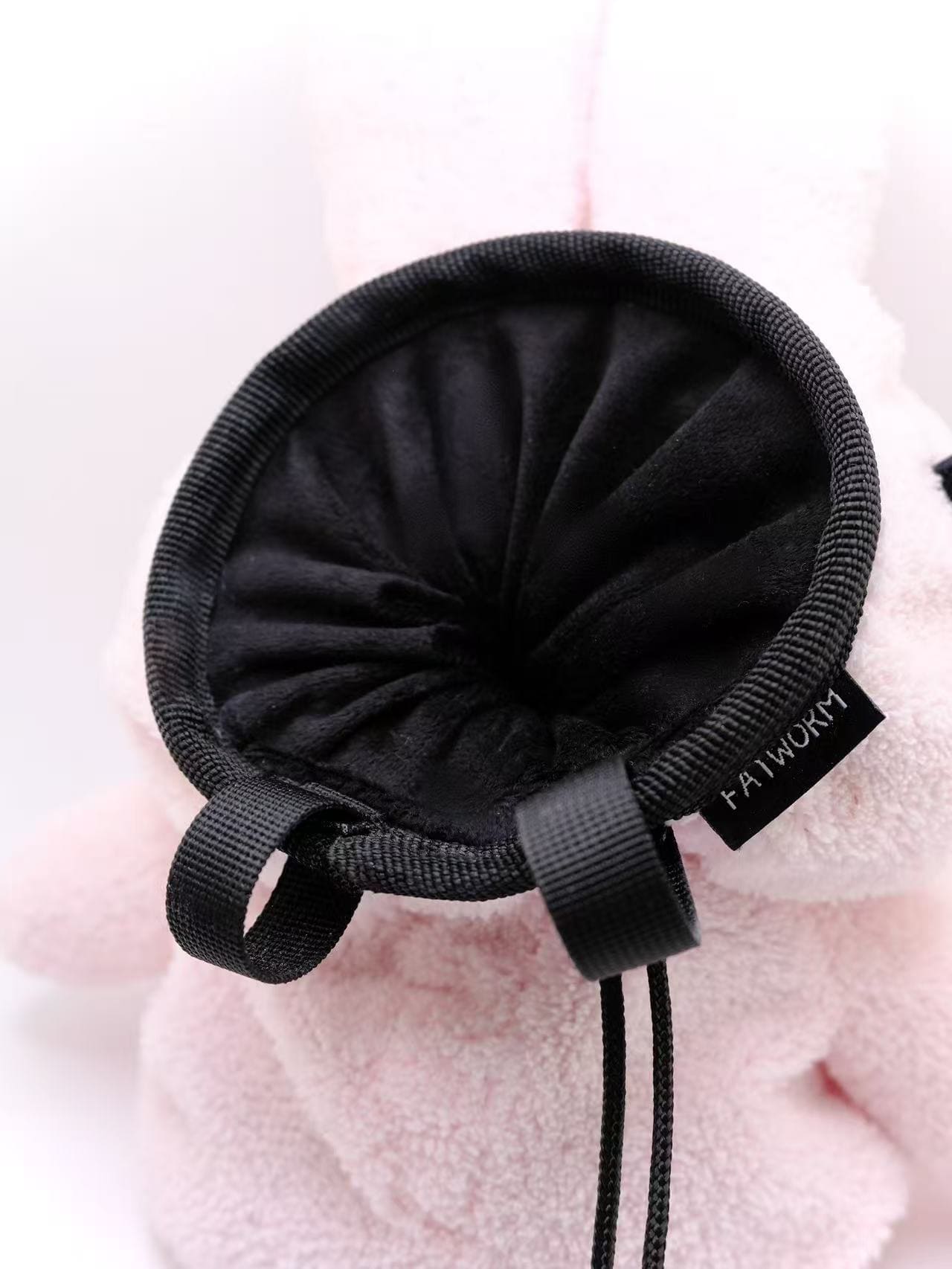 Cute climbing chalk bag in baby pink with Miffy bunny design; plush, functional Fatworm Chalkbag accessory