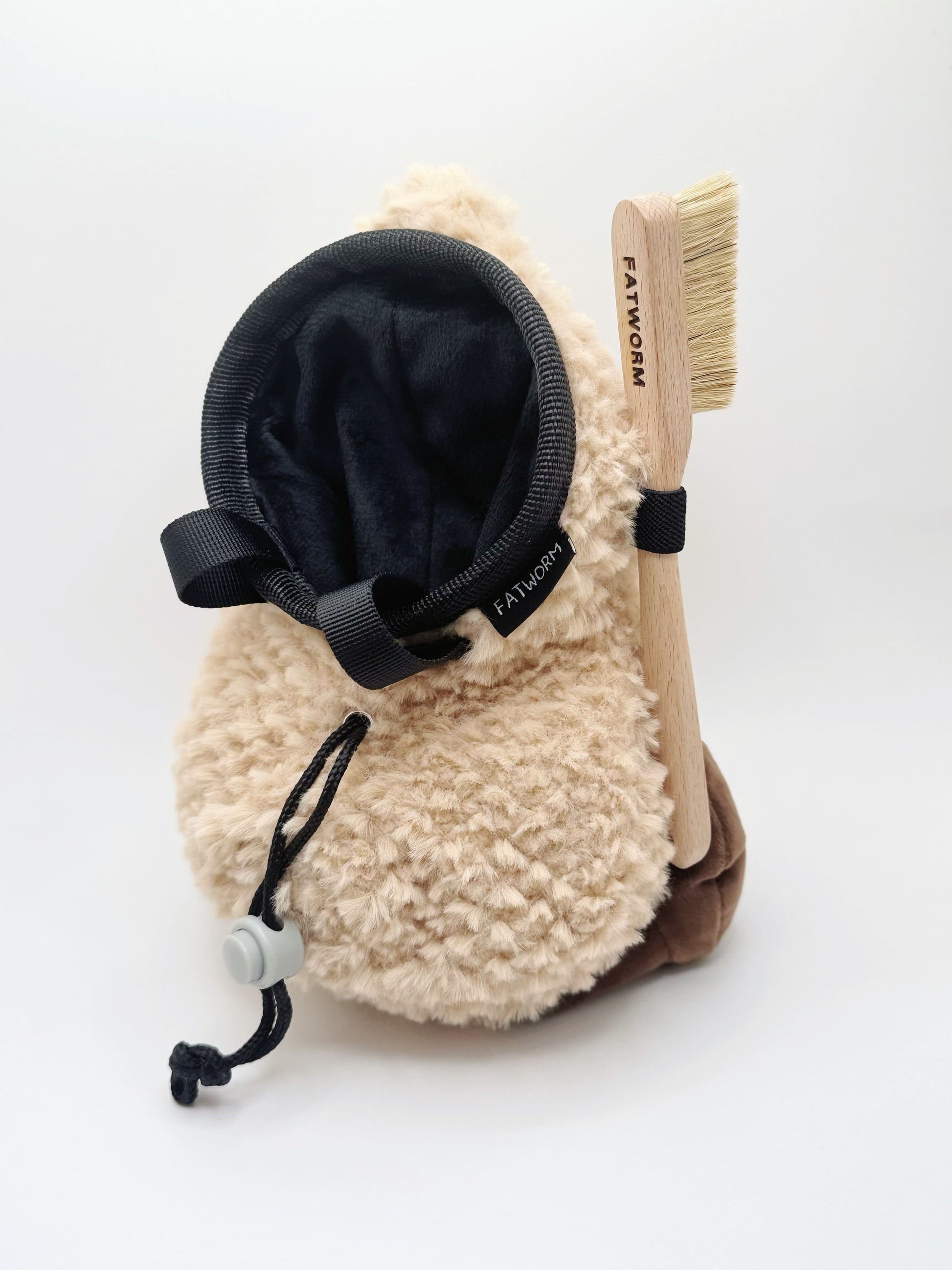 Happy Peanut Chalk Bag: a cute, plush climbing accessory with secure closure and soft lining. Perfect for bouldering and sport climbing.