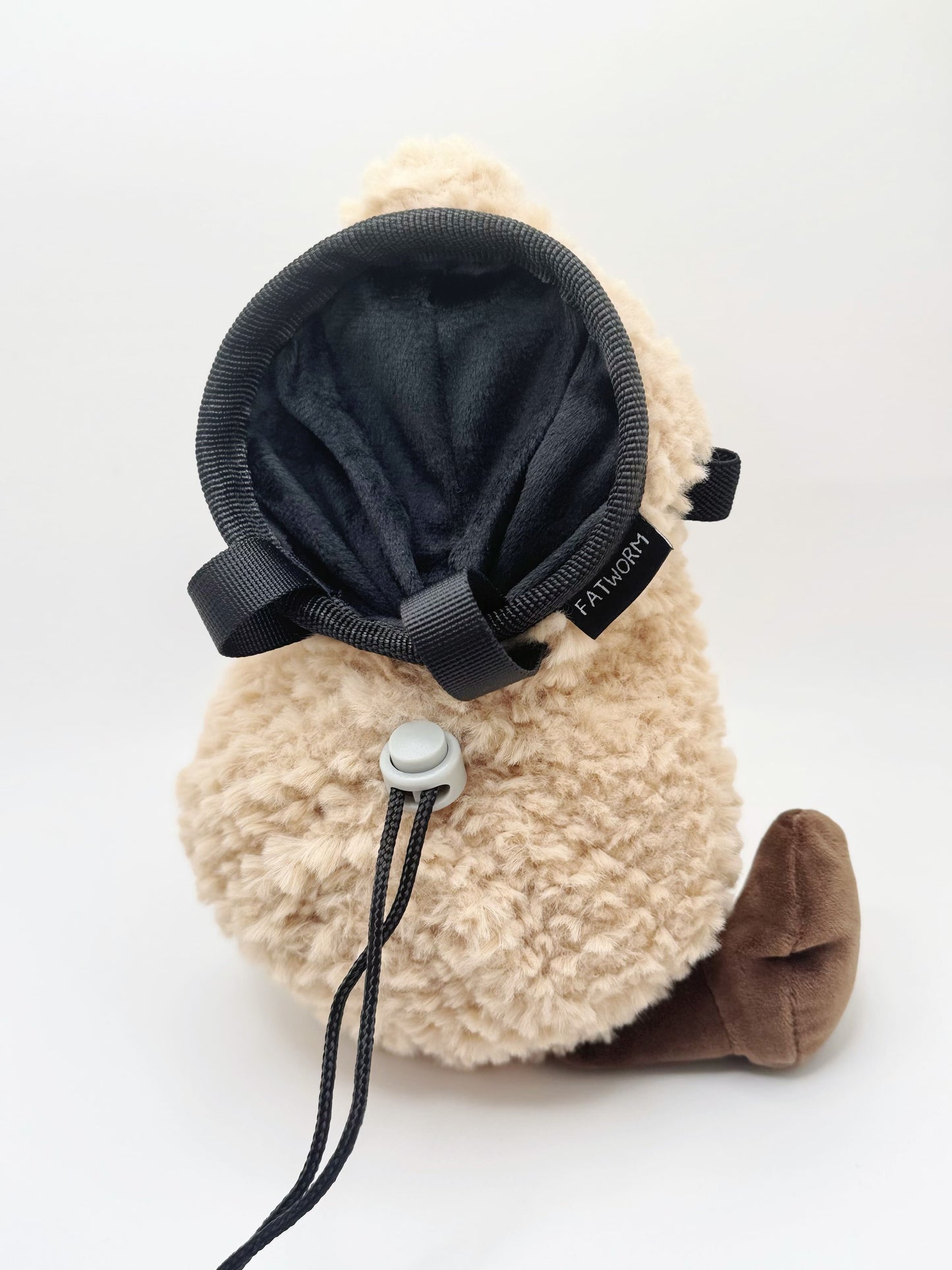 Happy Peanut Chalk Bag: a cute, plush climbing accessory with secure closure and soft lining. Perfect for bouldering and sport climbing.