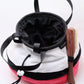A soft and fluffy Poke Ball plush chalk bag by Fatworm. This cute yet functional climbing gear features the iconic red, white, and black design in a long-durable handmade construction. The perfect climbing gift for climbers who love gaming accessories.
