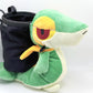A cute, handmade plush climbing chalk bag designed to look like the Snivy, featuring a sleek green and cream body with yellow leaf-like accents and large, confident eyes. Designed with high functionality by a climber, it includes a wide black rim opening at the top for easy chalk access. A great climbing gift for trainers who want to catch them all.