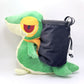 A cute, handmade plush climbing chalk bag designed to look like the Snivy, featuring a sleek green and cream body with yellow leaf-like accents and large, confident eyes. Designed with high functionality by a climber, it includes a wide black rim opening at the top for easy chalk access. A great climbing gift for trainers who want to catch them all.