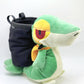 A cute, handmade plush climbing chalk bag designed to look like the Snivy, featuring a sleek green and cream body with yellow leaf-like accents and large, confident eyes. Designed with high functionality by a climber, it includes a wide black rim opening at the top for easy chalk access. A great climbing gift for trainers who want to catch them all.