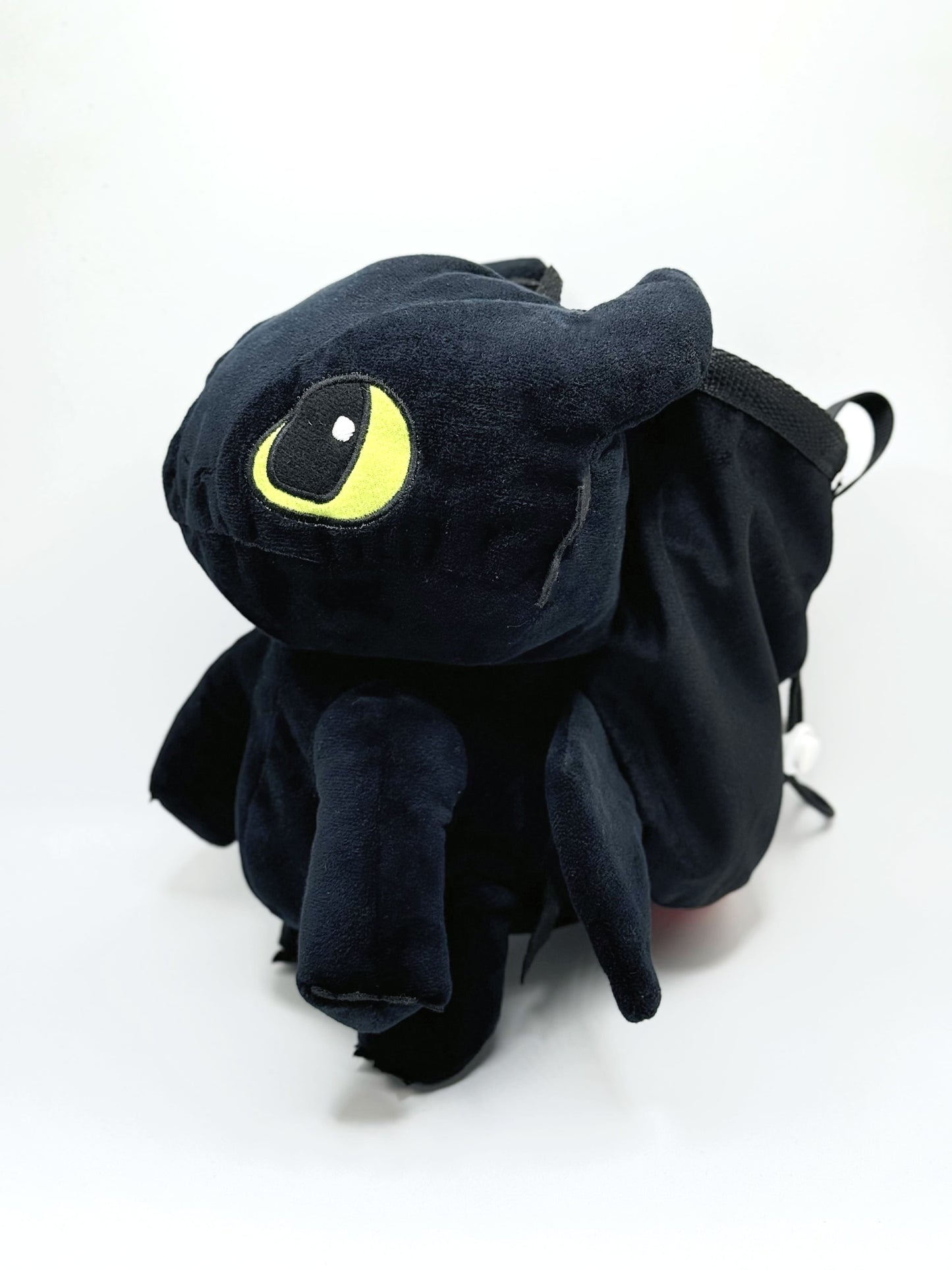 A soft and fluffy Night Fury Toothless "Classic Face" plush chalk bag by Fatworm. Featuring large expressive eyes and a long-durable handmade design, this cute and functional gear is the perfect climbing gift for climbers.