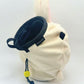 A cute, fluffy handmade plush climbing chalk bag featuring Usagi with a chaotic wide-eyed expression. Designed with high functionality by a climber, it includes a wide top rim opening for easy chalk access, fleece lining, a brush loop, and a spill-proof drawstring. A great bouldering gift for climbing fans.